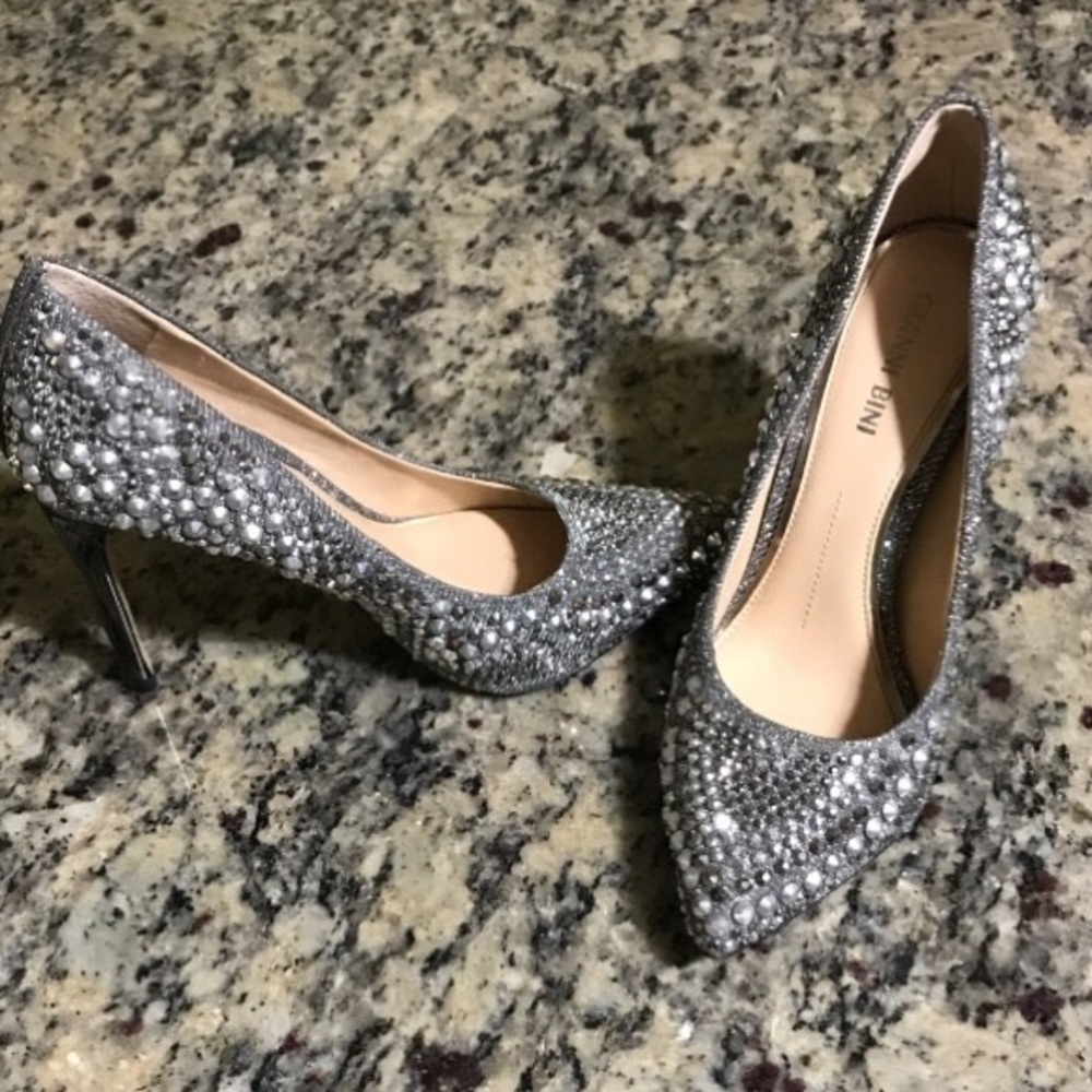 Pair of silver glittered heels